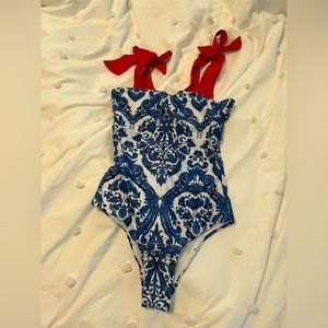 Blue and white one piece bathing suit